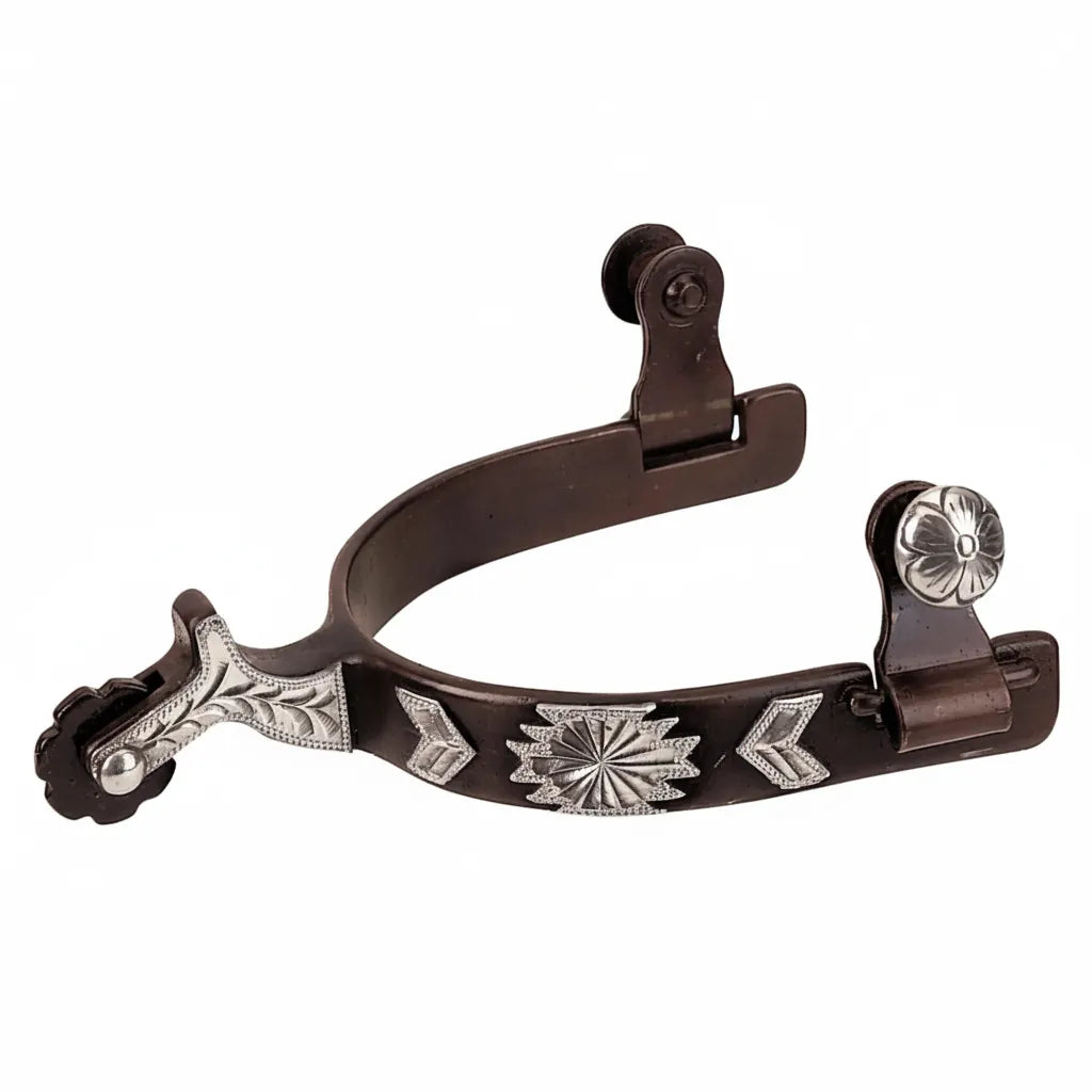 Weaver Leather Ladies' Stainless Steel Spurs featuring an antique black finish with ornate silver engraved overlays. These western-style spurs showcase a detailed sunburst motif, chevron accents on a 1-1/2" band, and scrolling floral designs on the 2-3/4" shank. Large silver flower conchos and a 10-point rowel complete these elegant equestrian accessories, perfect for horse show performance or everyday western riding.