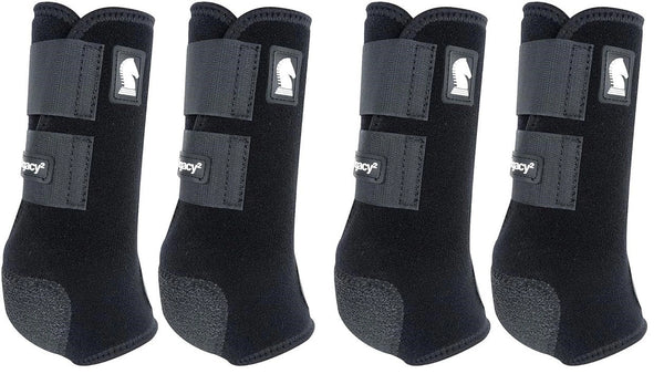 Four black protective horse boots with brand logo on a white background