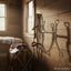 Myler MB 32-3 Sweet Iron Mullen Barrel Bit (5 inch mouth, Level 2) on a rustic wooden barn wall. A leather bridle and western saddle are visible in the background.