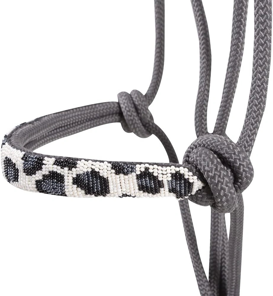 Bracelet with leopard print pattern on a gray cord against a white background