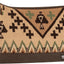Saddle pad with geometric pattern on a white background