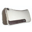 Professional's Choice 100% Wool Felt Contoured Saddle Pad in natural cream with rich brown leather wear leathers. This premium Western saddle pad features a thick wool felt exterior and plush fleece lining for superior pressure relief and horse comfort. Its anatomically contoured spine ensures a secure, ergonomic fit. A must-have piece of equestrian tack for performance and everyday riding, blending durability with classic Western style.