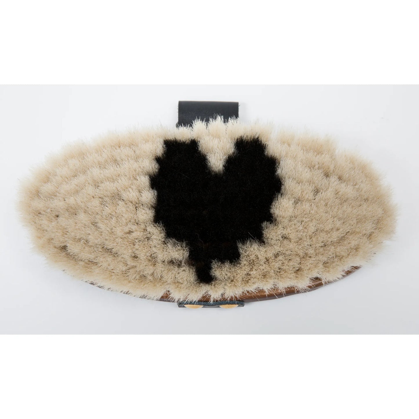 Professional's Choice Dark Wood Soft Goat Hair Brush featuring light cream bristles with a distinctive black heart-shaped center. This premium oval horse grooming brush includes an adjustable black leather handle and a polished dark wood base. Ideal as a soft finishing brush for sensitive horses, it's a stylish and functional addition to any equestrian grooming kit for achieving a show-ring shine.