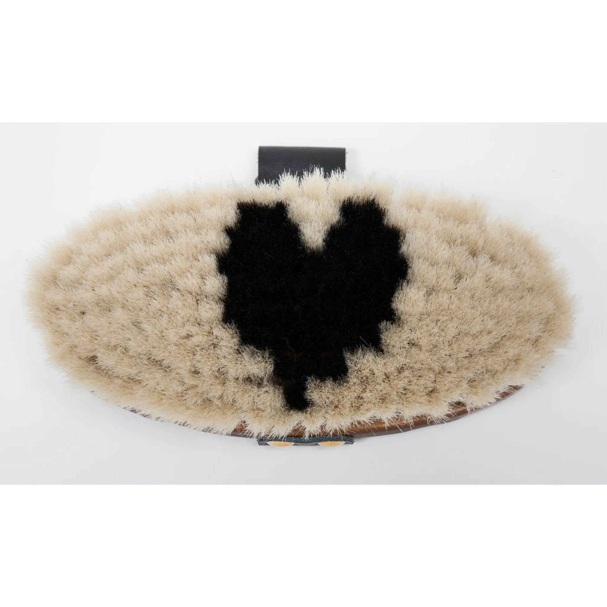 Professional's Choice Dark Wood Soft Goat Hair Brush featuring light cream bristles with a distinctive black heart-shaped center. This premium oval horse grooming brush includes an adjustable black leather handle and a polished dark wood base. Ideal as a soft finishing brush for sensitive horses, it's a stylish and functional addition to any equestrian grooming kit for achieving a show-ring shine.