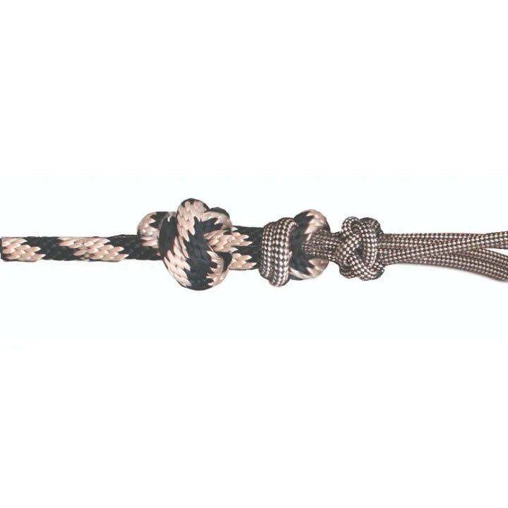 Professional's Choice Easy ON Rope Halter detail featuring heavy-duty knots and high-quality nylon rope in a black and tan pattern. This durable horse training halter is designed for quick application and long-lasting performance. The intricate weaving and sturdy construction make it a must-have for horse enthusiasts looking for reliable, stylish tack. Perfect for daily use or professional horse training.