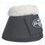 Professional's Choice black overreach bell boots featuring a soft white fleece collar for ultimate comfort and protection. These durable horse bell boots have a textured outer shell to resist impact and a secure hook-and-loop closure with the iconic Professional's Choice logo. Perfect for preventing overreach injuries during training, jumping, or turnout. High-performance equestrian hoof protection gear for horses.