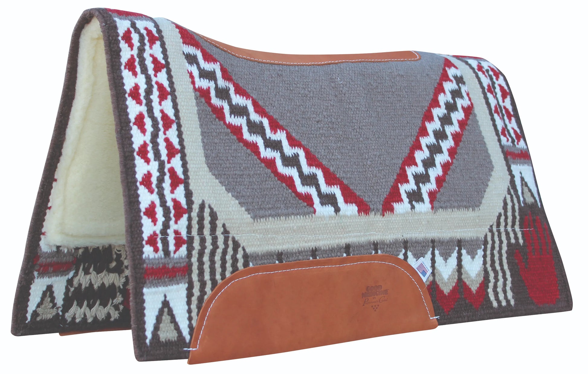 Professional's Choice Good Medicine Western saddle pad featuring a woven New Zealand wool top with grey, red, and white Southwestern geometric patterns and a red handprint. The pad is contoured with leather reinforcement along the spine and side wear leathers, finished with a plush cream fleece underside.