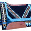 A Western saddle pad from the Professional's Choice Good Medicine collection. The pad features a geometric Southwestern design in turquoise, black, tan, and white New Zealand wool. It has a contoured shape with leather reinforcements along the spine and withers, large brown leather wear leathers with a logo stamp, and a thick cream-colored fleece lining.
