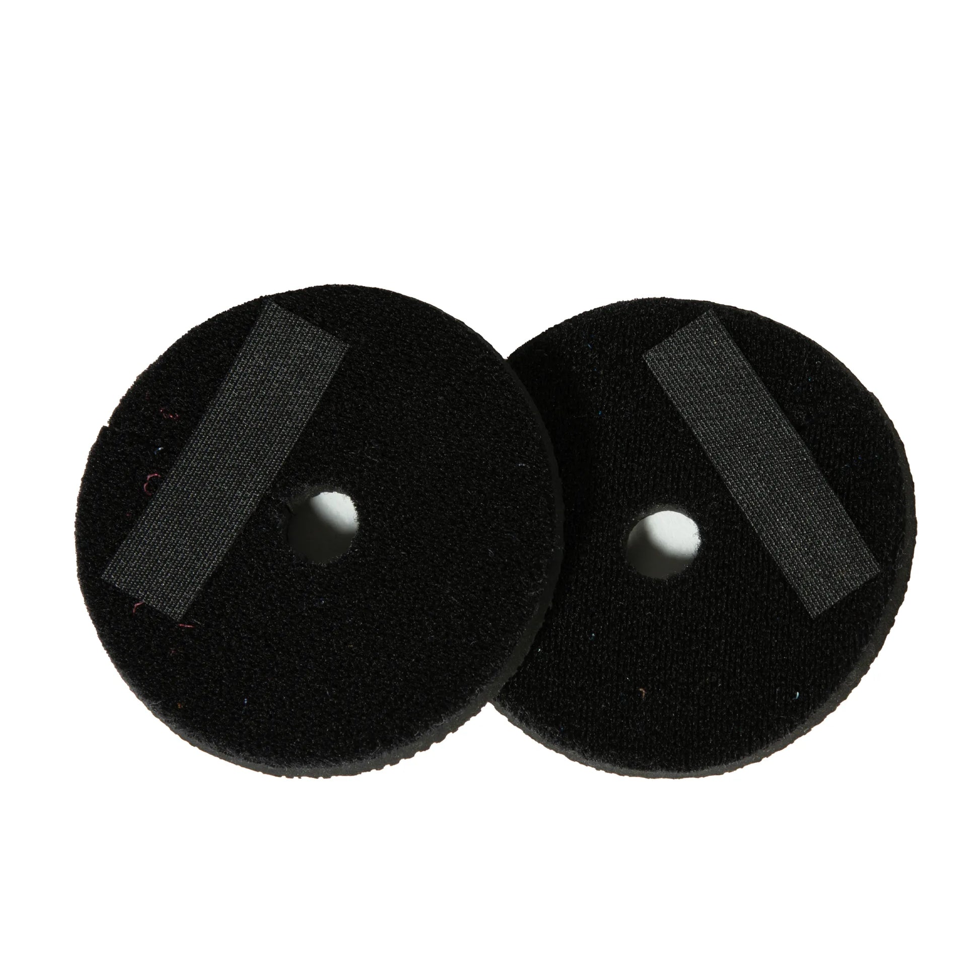 Professional's Choice black neoprene bit guards designed to prevent pinching and sores for improved horse comfort. This pair of soft, circular bit accessories features a central hole for a universal fit and a durable ribbed strap for secure attachment. High-quality equestrian gear essential for protecting your horse's mouth while training or riding.