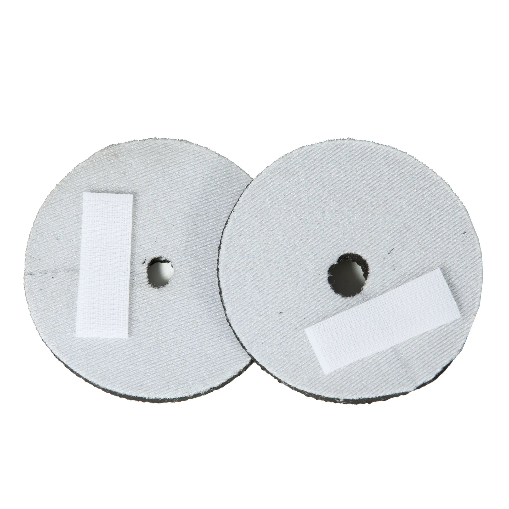 Professional's Choice Neoprene Bit Guards in white. These circular horse bit guards are designed to prevent the bit from pinching the horse's mouth. Each guard features a soft neoprene material and a convenient hook-and-loop Velcro strap for easy attachment to any horse bit. Essential equestrian gear for added comfort and protection during training or trail rides.