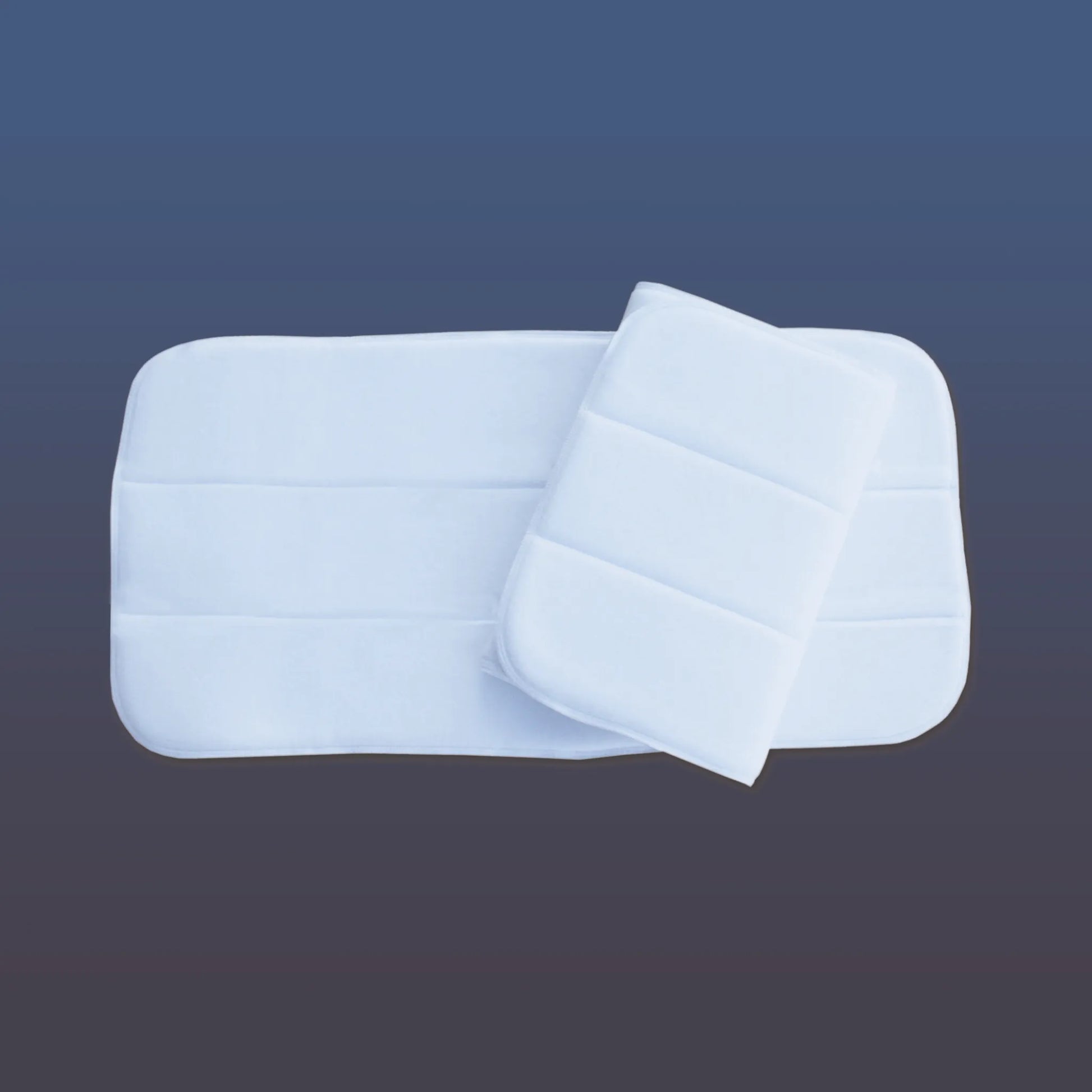 Professional's Choice No-Bow Horse Wraps in clean white. These premium padded leg bandages feature a soft, quilted three-channel design for even pressure and maximum protection. Perfect for use as horse standing wraps or shipping bandages, these high-quality equestrian wraps provide superior support and comfort for your horse's legs. Durable and breathable for professional-grade horse care.