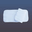 Professional's Choice No-Bow Horse Wraps in white, featuring two thick, quilted pads designed for premium equestrian leg protection. One wrap is laid flat while the other is folded, showcasing the soft fabric and padded construction. These high-quality leg bandages provide uniform pressure for horse standing and shipping, ensuring maximum comfort and support during travel or recovery in the stable.