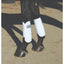 Professional's Choice Pro Performance Elite XC Boots in white, front pair, shown on a black horse. These medium-sized horse boots feature a breathable, shock-absorbing design with a textured protective shell and secure wrap-around straps. Ideal for cross-country jumping and high-impact equestrian activities, offering superior leg protection and a comfortable, anatomical fit for your horse.