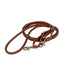 Professional's Choice Ranch Rein in heavy oil brown leather. These premium western horse reins feature durable scissor snaps for quick bit attachment and a weighted, high-quality feel for superior grip and control. Ideal for ranch work, training, and trail riding, these leather reins offer a classic look with professional performance.