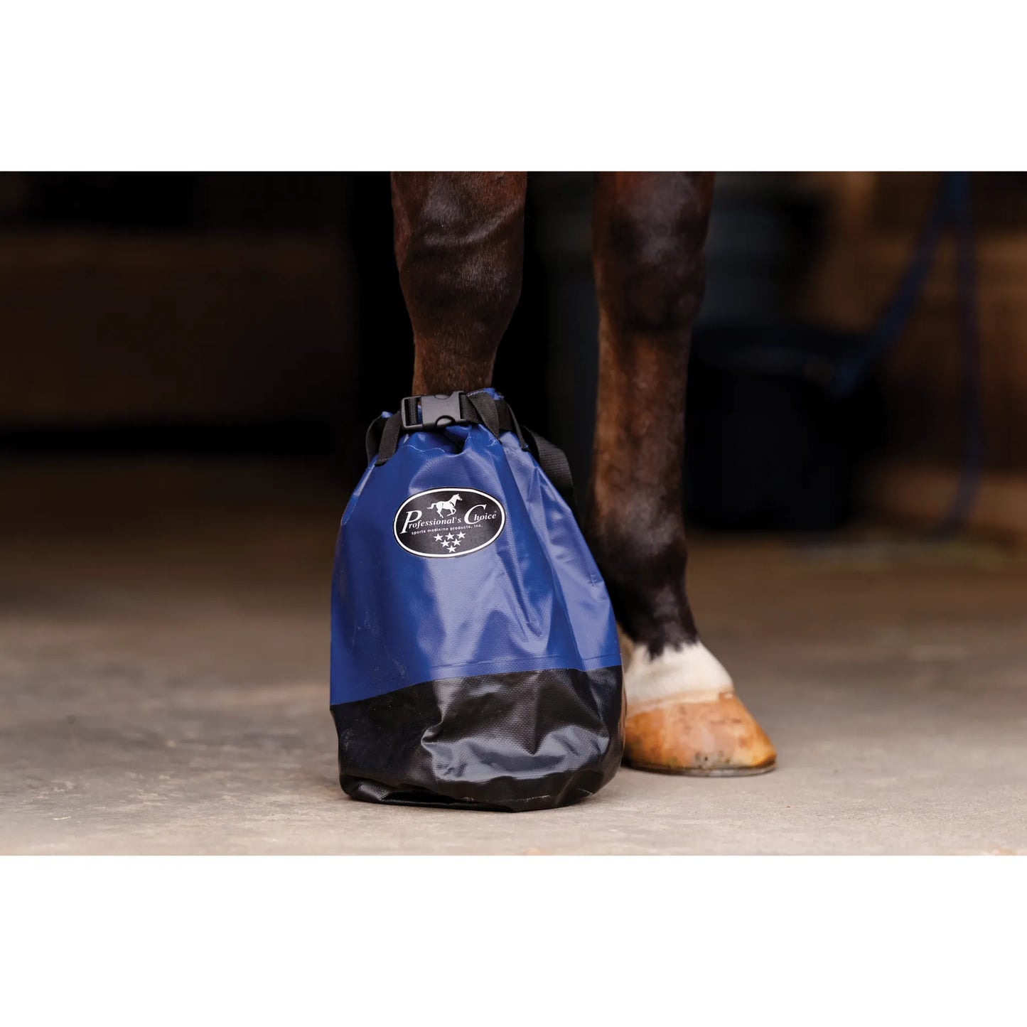 Professional's Choice Short 14" Hoof Soaking Boot in royal blue and black. Designed for equine therapy, this durable, waterproof soaking bag features a heavy-duty bottom and a secure buckle strap around the horse's leg. Perfect for treating abscesses, thrush, or moisturizing dry hooves. A must-have horse health accessory for every barn and grooming kit.
