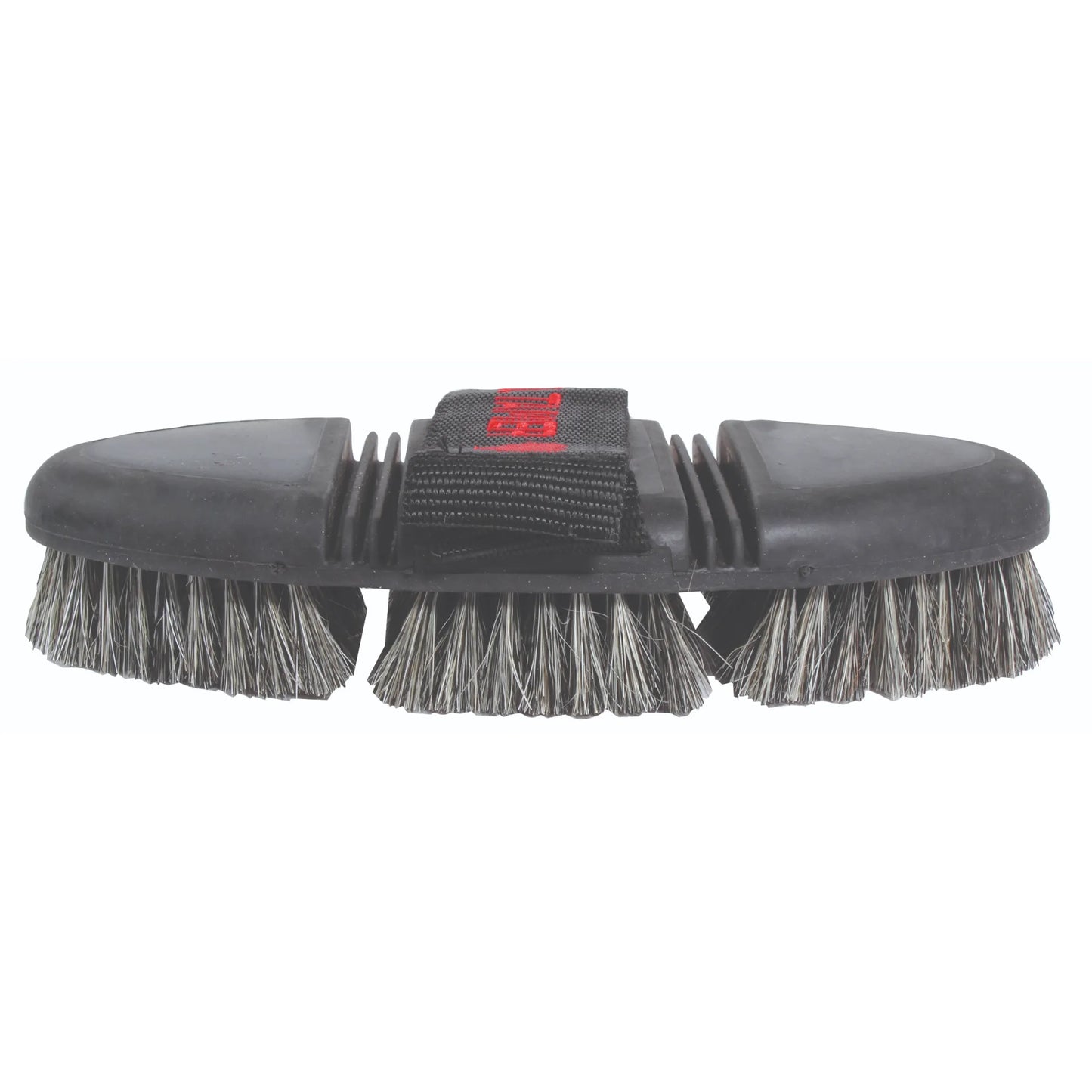 Professional's Choice Tail Tamer Soft Touch Flex Pig Bristle Brush in Black. This ergonomic, flexible horse grooming brush features three sections of dense pig bristles to enhance coat shine. The soft-touch black handle includes an adjustable hand strap with red lettering for a secure grip. A must-have equestrian tool for gentle grooming and finishing, ideal for horse care kits and professional grooming routines.