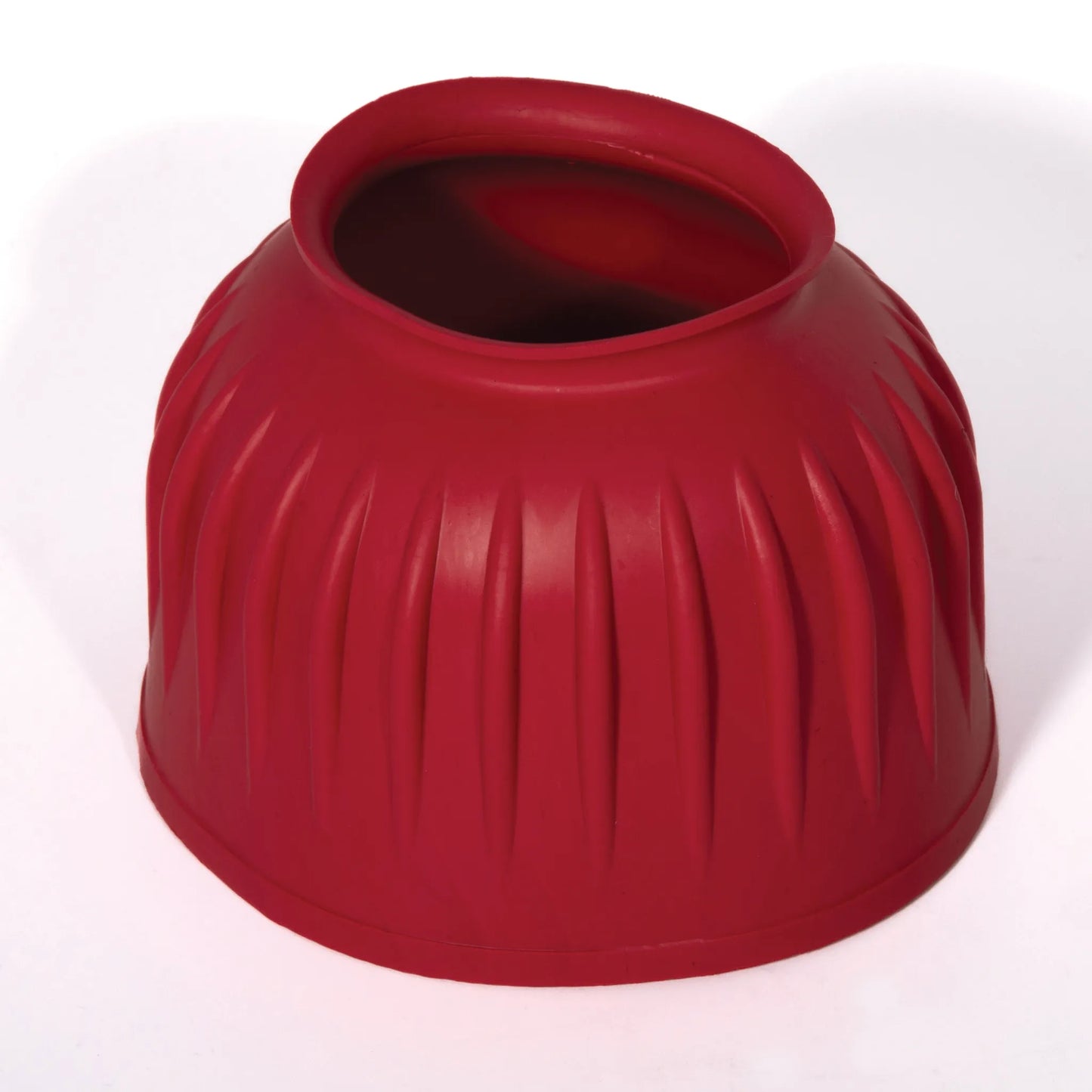 Professional's Choice red rubber bell boot featuring a durable ribbed design for maximum hoof and coronary band protection. These heavy-duty overreach boots for horses offer impact resistance and a secure pull-on fit, perfect for equestrian training, performance, or turnout. High-quality red rubber boot essential for protecting your horse from strikes and overreaching.