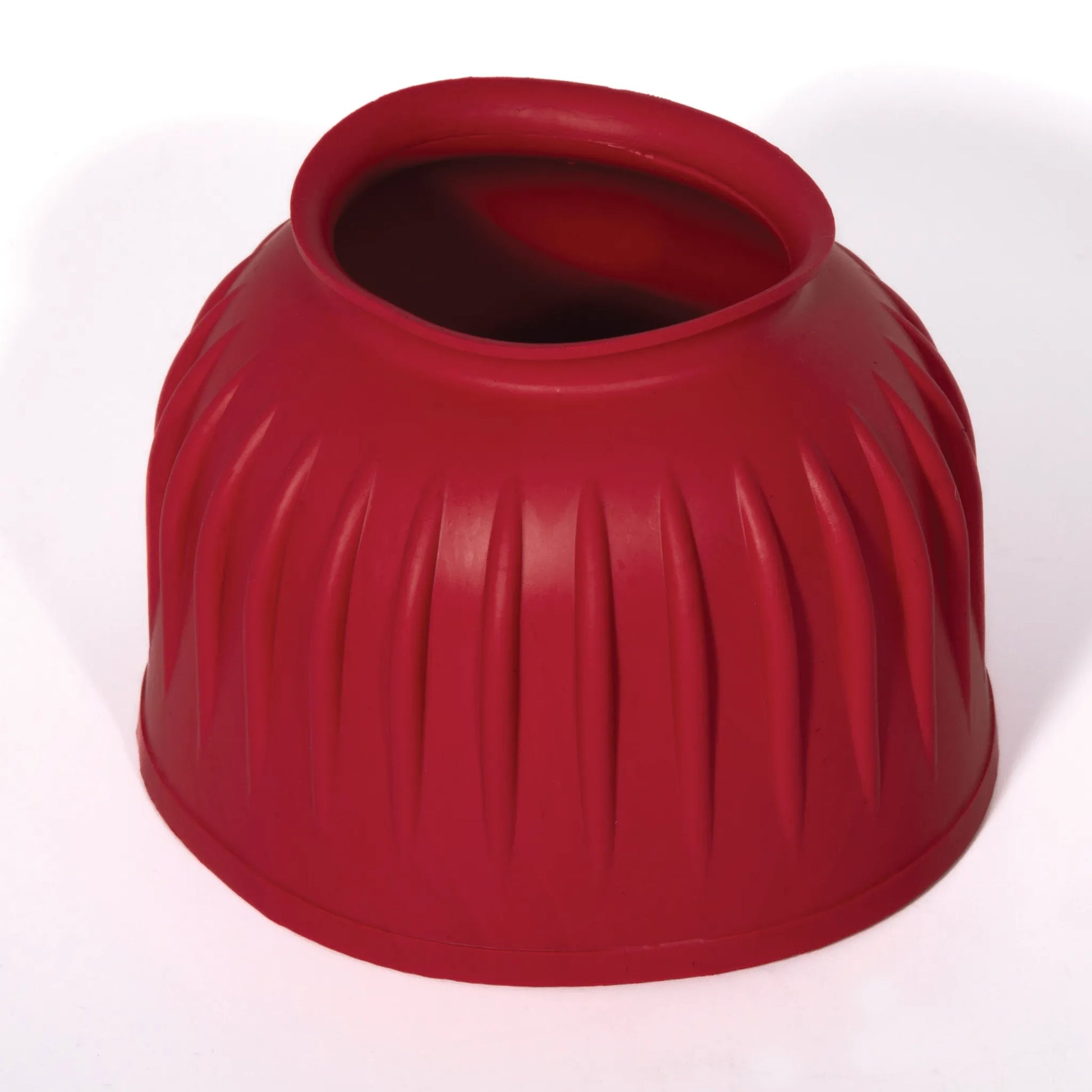 Professional's Choice red rubber bell boot featuring a durable ribbed design for maximum hoof and coronary band protection. These heavy-duty overreach boots for horses offer impact resistance and a secure pull-on fit, perfect for equestrian training, performance, or turnout. High-quality red rubber boot essential for protecting your horse from strikes and overreaching.