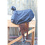 Professionals Choice Black Western Saddle Cover draped over a detailed leather saddle on a wooden stand. This durable, water-resistant cover protects the seat, cantle, and horn from dust, debris, and scratches. The sleek black material ensures a snug fit, while the tooled leather fenders and silver stirrups remain visible below. Ideal equestrian gear for preserving high-quality western saddles in the tack room or during travel.