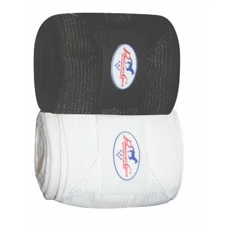 Professionals Choice Combo Bandages shown in a set of black and white rolls. These equestrian leg wraps provide superior support and protection for horses, combining the benefits of polo wraps and track bandages. Each wrap features a ribbed elastic exterior and a secure hook-and-loop closure adorned with the iconic blue and red logo. Perfect for training, schooling, and injury prevention, these durable wraps are essential horse tack for any equestrian.