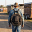 Professional's Choice Rope Bag Backpack worn hands-free at the rodeo grounds
