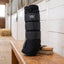 Toklat stable boot standing on a barn bench