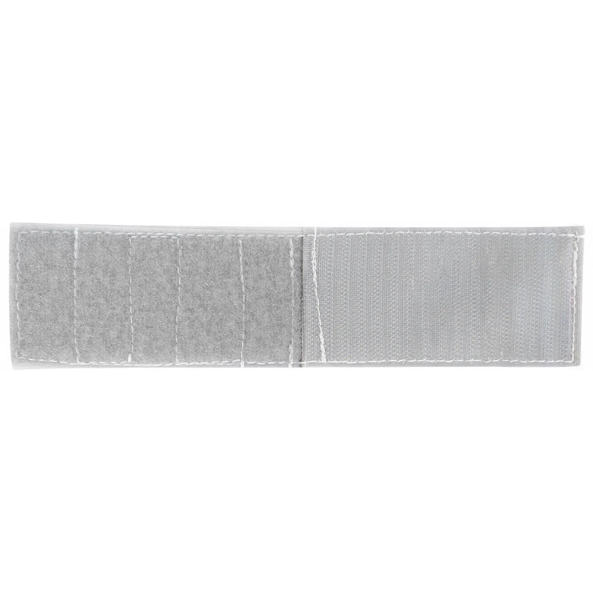 Cashel Fly Mask Extender - 5 Inch Hook-and-Loop Jaw Extension in light gray. This durable horse tack accessory features segmented loop sections and a secure hook fastener with reinforced white stitching. Perfect for customizing the fit of equine fly masks, ensuring comfort and protection for horses with larger jaws or unique sizing needs. High-quality gray fly mask strap extension for a secure, adjustable fit.
