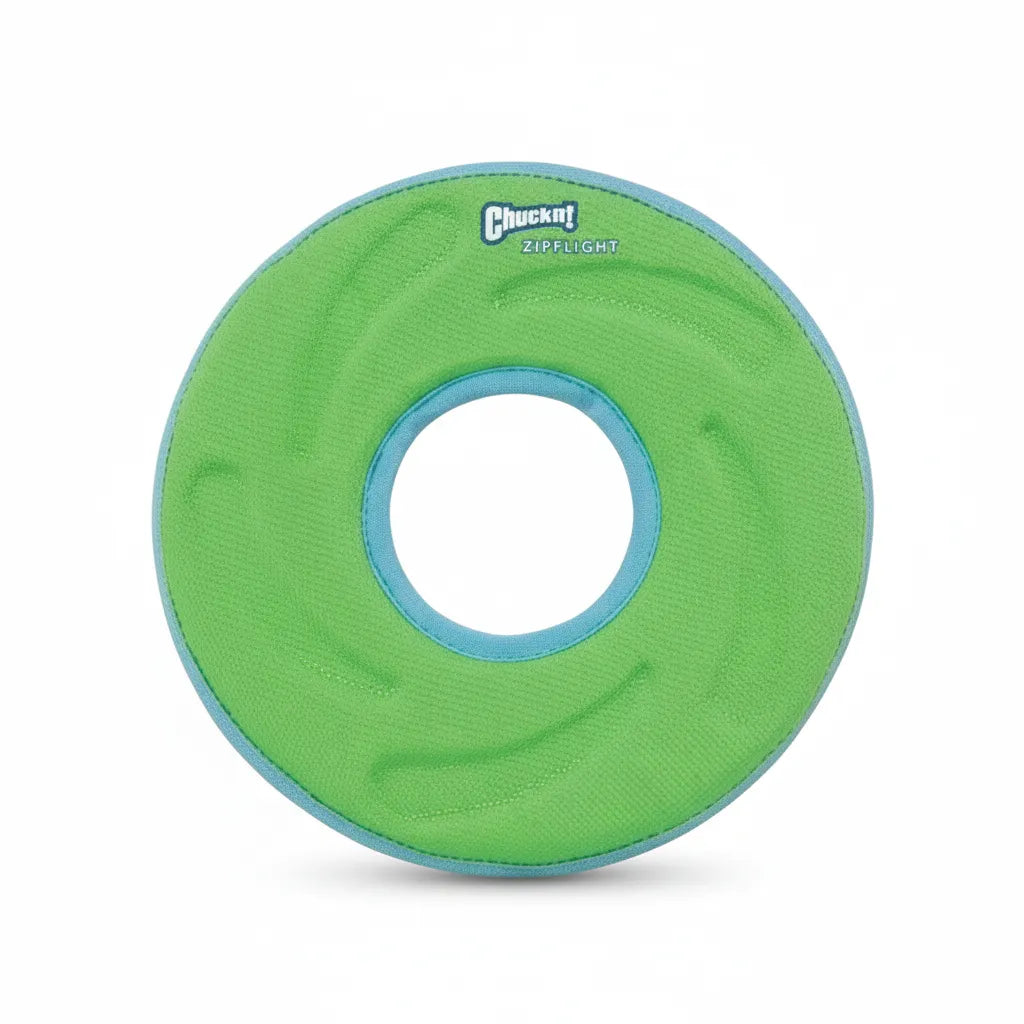 Chuckit! Zipflight Aerodynamic Floating Dog Toy in high-visibility neon green with light blue fabric trim. This medium-sized, ring-shaped fetch toy features a soft yet durable construction designed to float and fly. Its aerodynamic shape and textured surface make it easy for pets to track and retrieve in water or on land. Perfect for active dogs who love outdoor play and long-distance games of catch at the pool, beach, or park.