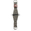 Classic Equine Colored Twist 100% Mohair Horse Cinch with a black and white twisted cord pattern. This durable western cinch features a stainless steel roller buckle for easy tightening, center D-rings on a black nylon strap, and a brown leather logo keeper. Ideal for horse comfort and performance, this natural fiber mohair girth is perfect for western saddles and trail riding.