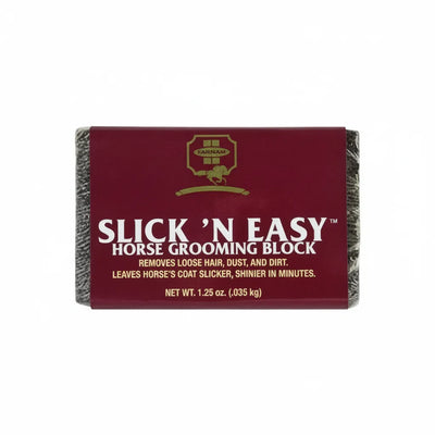 Farnam Slick 'N Easy Horse Grooming Block featuring a maroon wrapper and a dark, textured shedding stone. This essential equestrian tool removes loose hair, dust, dirt, and bot eggs to leave horse coats slick and shiny in minutes. A compact 1.25 oz block, it is perfect for spring shedding season and works as a powerful shedding and bot egg remover for a professional grooming finish.