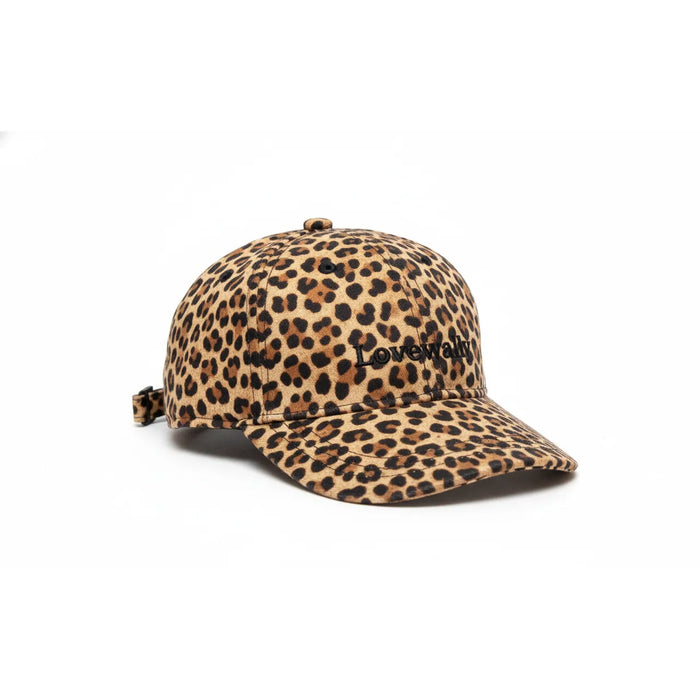 Lovewally medium leopard print dog outdoor adventure hat featuring a stylish animal print and black embroidered logo on the front. This chic pet baseball cap provides essential sun protection during walks and hikes. Designed with an adjustable back strap for a secure fit, it's the perfect fashionable accessory for your adventurous pup.