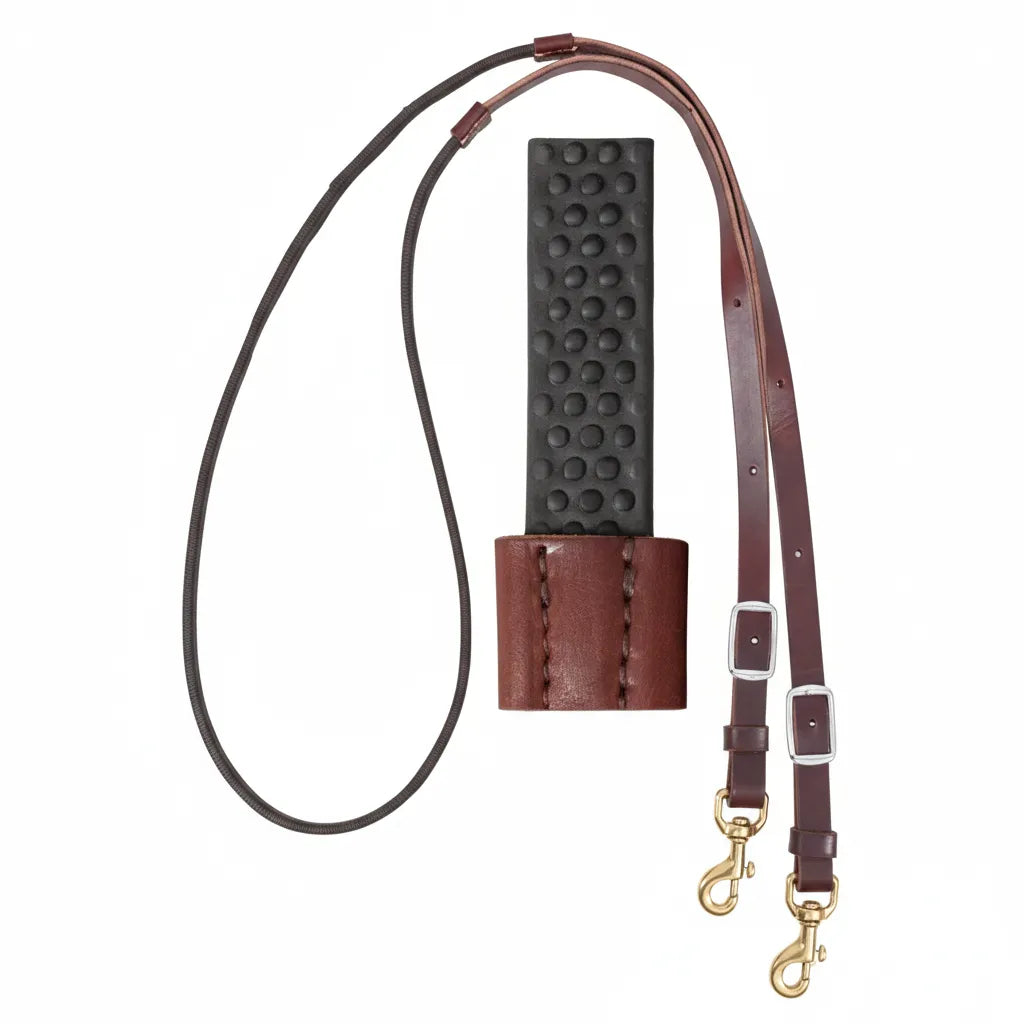 Martin Saddlery 3/4" Barrel Reins featuring rich burgundy Latigo leather and a textured black Biothane non-slip grip. These professional continuous loop reins include adjustable silver buckles and durable brass scissor snaps for secure attachment. Perfect for barrel racing and performance western riding, these high-quality horse reins offer superior control and a classic aesthetic.