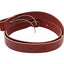 Professional's Choice Beveled Edge Latigo Leather Tie Strap for western saddles, featuring a rich burgundy color and pre-punched holes. This 1 3/4" x 6' heavy-duty cinch strap is made in the USA from premium leather for durability and safety. High-quality horse tack designed for secure saddle attachment and long-lasting performance.