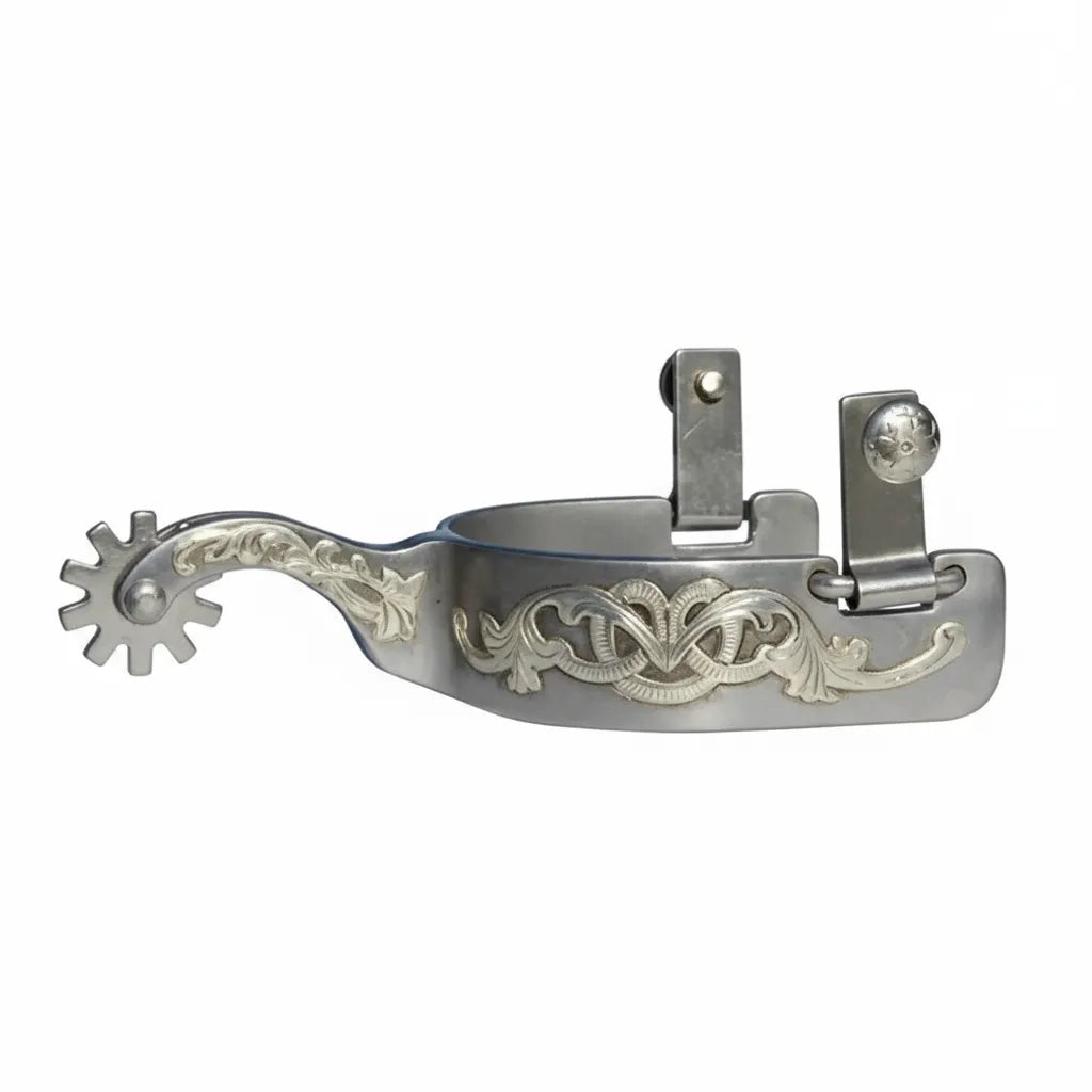 Bob Avila AV Floral Engraved Western Spurs by Professional's Choice. These elegant silver spurs feature an intricate floral overlay on a 1" heel band, a 10-point star rowel, and a medium shank. Perfect for western performance, reining, or trail riding, these durable stainless steel spurs combine professional-grade functionality with classic cowboy style. Ideal for equestrians looking for precision control and high-quality craftsmanship in their horse riding gear.