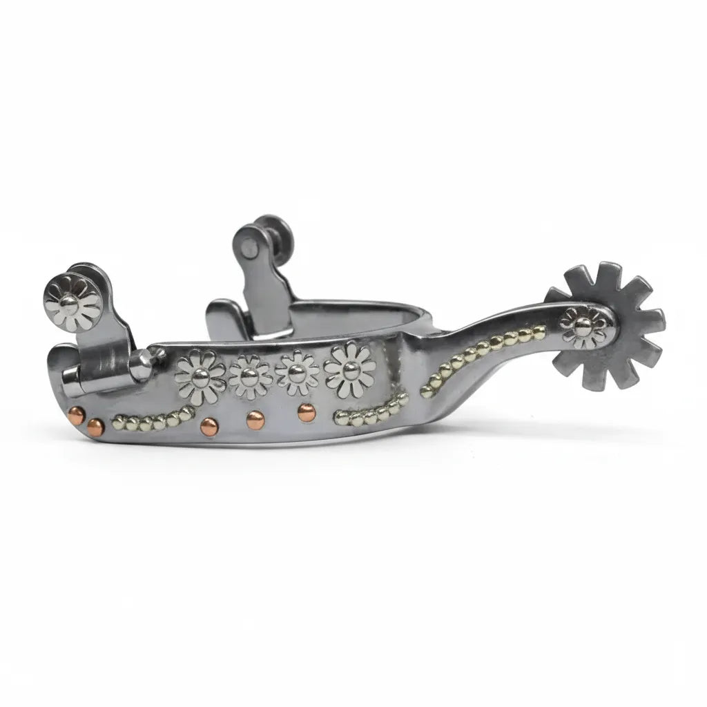 Professional's Choice Bob Avila Lady Daisy Western Spurs for women featuring a polished silver finish with decorative daisy floral overlays, copper accents, and elegant beaded trim. This equestrian gear includes a 1" heel band, 2.5" curved shank, and a 10-point rowel. High-quality, stylish cowgirl spurs perfect for western riding, horse shows, and ranch work.