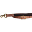 Professional's Choice Ultimate Tiedown featuring a dark brown ribbed polyester strap and adjustable light tan leather ends. The design includes premium brass hardware with a swivel snap and an adjustable buckle for a custom fit. High-quality white stitching adds durability to this essential piece of equestrian horse tack, perfect for western riding and training.