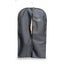 Professionals Choice Garment Bag in black, featuring a full-length center zipper for easy access to show coats. This durable equestrian travel bag includes the signature white horse logo and provides premium protection for riding apparel. Shown with a tan show coat tucked inside and a sturdy metal hanger, it’s an essential for horse show organization and travel. Model HA-911.