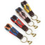 Shires Aubrion Polo Keyrings featuring premium 100% leather loops with traditional multi-colored pampa cross embroidery. This set of four equestrian accessories showcases vibrant patterns in red, navy, pink, and yellow. Each keychain is finished with a gold-tone split ring and a signature horse-shaped charm. A stylish and durable gift for horse lovers, these keyrings bring classic polo fashion to everyday essentials.
