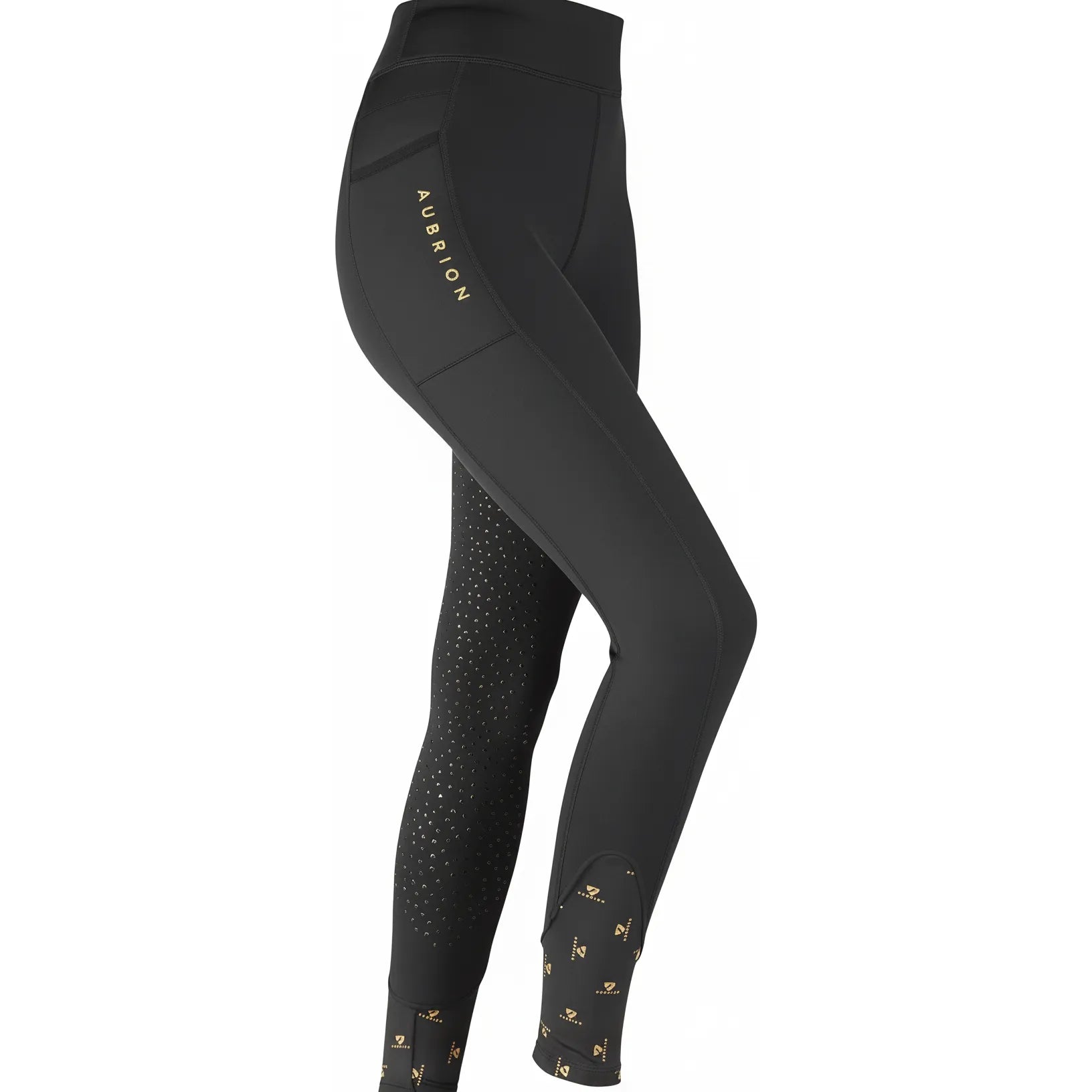 Shires Aubrion Porter Maids Winter Riding Tights in black, featuring a side phone pocket with gold branding and silicone grip on the inner legs for equestrian stability. These fleece-lined riding leggings include stylish gold-patterned ankle cuffs and a high-waist design, perfect for keeping young riders warm in the saddle during winter.