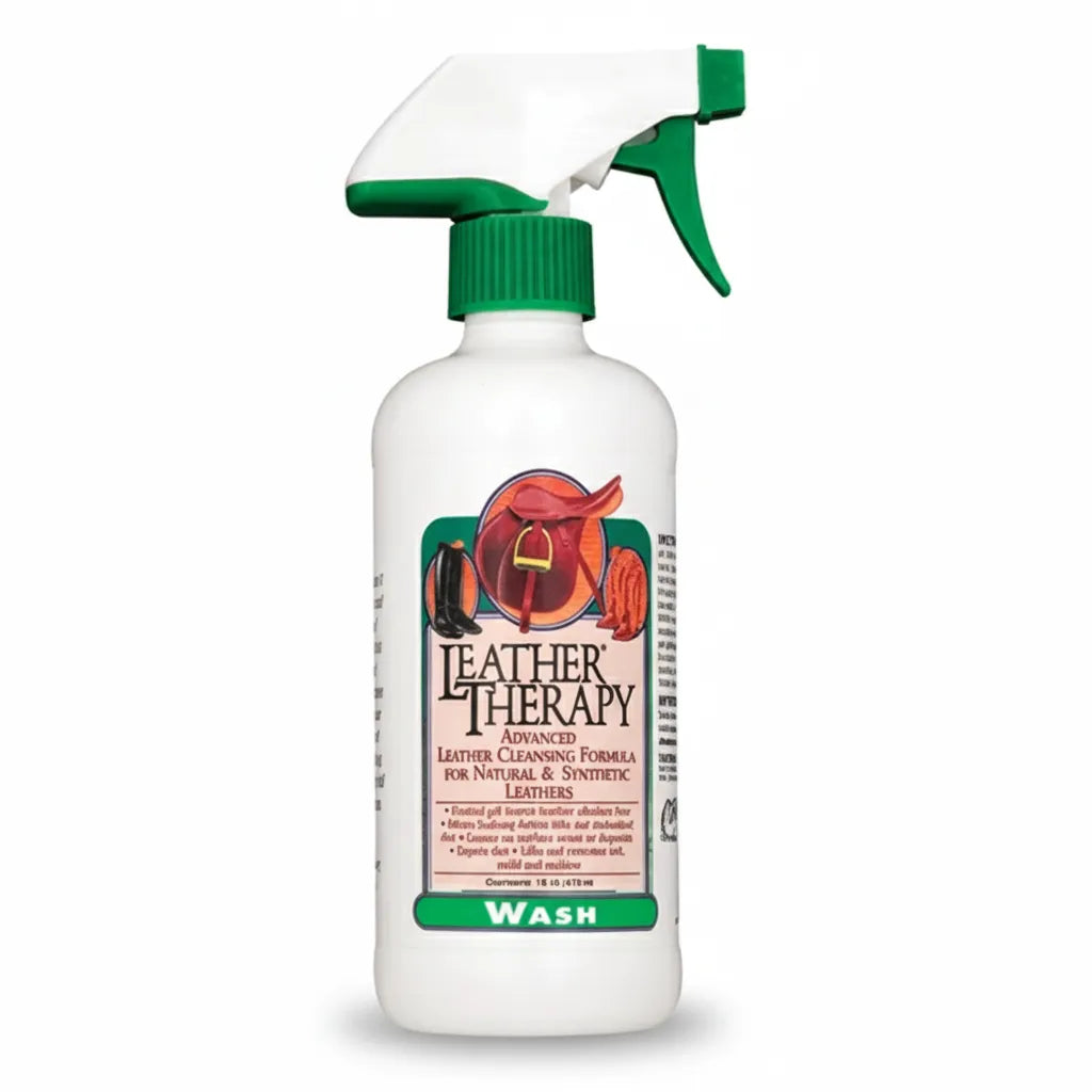 Weaver Leather Leather Therapy Wash 16 oz spray bottle with a green trigger. High-performance advanced cleansing formula with concentrated micro-suds to clean and condition natural and synthetic leathers. Perfect for equestrian gear like horse saddles, tack, and leather boots. This deep-cleaning wash removes grime and maintains leather health, making it an essential tack room supply for horse owners and leather care enthusiasts.