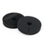 Pair of black Weaver Leather Neoprene Bit Guards with a universal fit and hook and loop closures. These circular horse bit accessories feature a slit and center hole for easy attachment, preventing bit pinching and improving equine comfort. Durable, professional-grade equestrian tack perfect for training and daily riding.