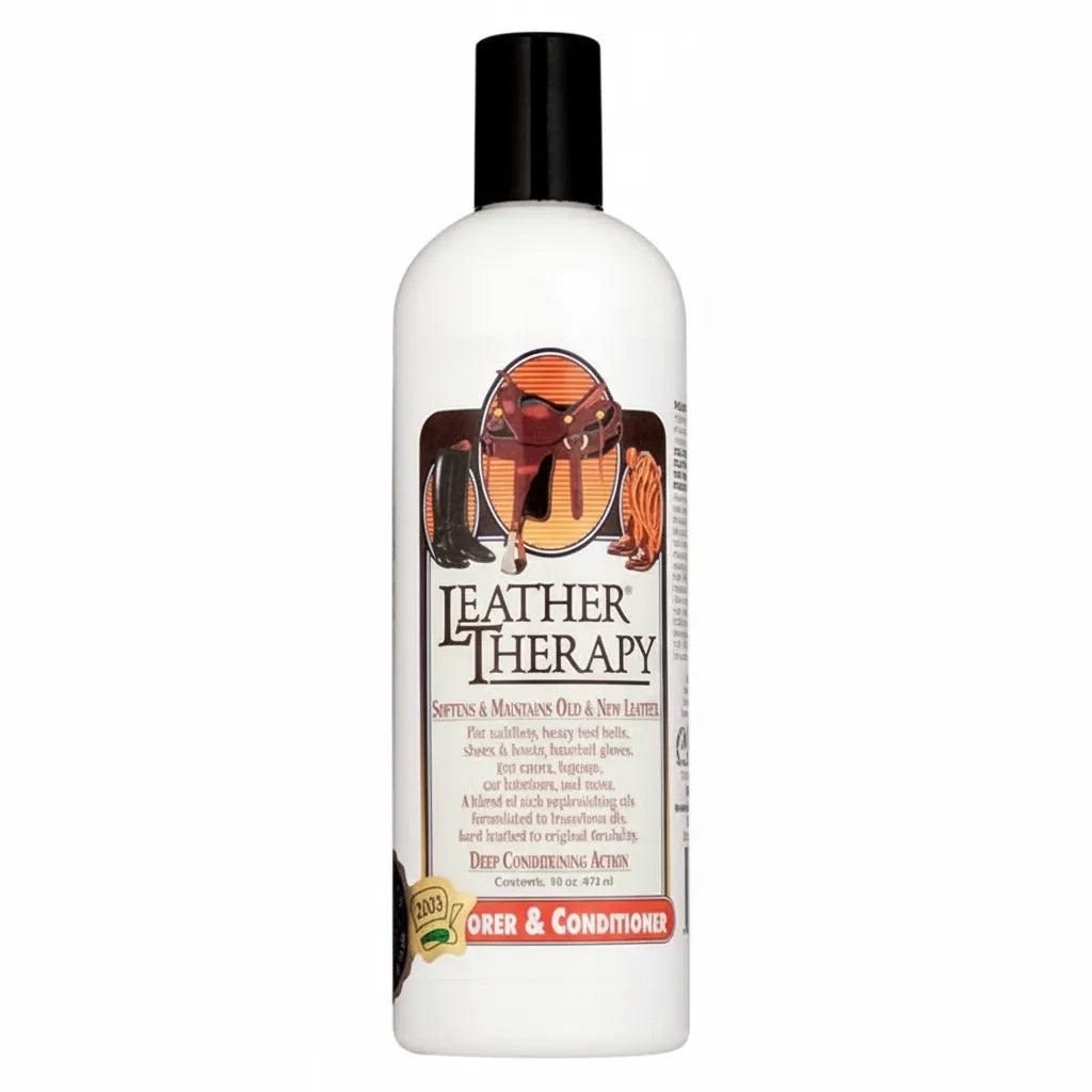 Weaver Leather Therapy Restorer and Conditioner in a 16 oz white bottle with a black cap. This deep conditioning leather rejuvenator and mold remover is designed to soften and maintain old and new leather items like saddles, boots, and tack. The label features a western saddle and riding boots, emphasizing its deep conditioning action for restoring suppleness. Ideal for equestrian gear care, this formula helps preserve and revitalize premium leather goods.