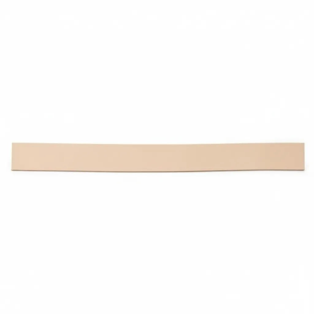 Natural tan Weaver Leather unpunched stirrup leathers, 2 inches wide and 5'6" long. This heavy-duty leather strap is designed for a custom fit, perfect for equestrian gear maintenance, DIY horse tack projects, and reliable saddle performance. A versatile, high-quality leather strip essential for custom stirrup adjustments and durable horse riding equipment.