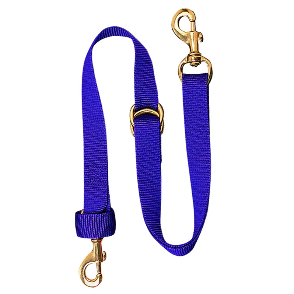 Weaver Leather Deluxe 40-inch Tie Down in royal blue nylon, featuring durable brass-plated hardware. This high-quality equestrian tack includes two heavy-duty swivel snaps, a sliding D-ring, and a keeper for a customizable, secure fit. Perfect for horse training and western riding, this stylish royal blue tie down adds a professional touch to your horse's gear collection.