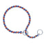 Weaver Leather Laced Chain Slip Collar for dogs, featuring a durable chrome-plated steel chain woven with vibrant red and blue cord for a stylish, quiet, and comfortable walking experience. This heavy-duty training collar includes two polished O-rings for secure leash attachment and smooth slip action, making it an essential tool for effective pet training and controlled outdoor adventures.