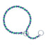 Weaver Leather Laced Chain Slip Collar featuring chrome-plated links interwoven with vibrant neon green and purple cord. This durable training collar provides a quiet and comfortable alternative to traditional metal choke chains. Designed with two sturdy rings for secure leash attachment, it combines style and functionality for effective dog training and daily walks. Ideal for pet owners looking for a colorful, professional-grade slip collar.