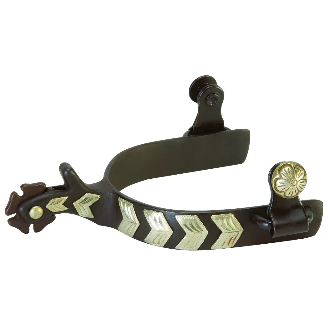 Weaver Leather Men's Show Spurs featuring a 1.25-inch band with a dark antique finish. The design highlights striking German silver chevron trim with intricate hand-etched patterns and a decorative floral concho button. These western riding spurs include a blunt-point rowel for gentle horse communication. High-quality equestrian tack perfect for the show ring, western pleasure, or ranch riding.