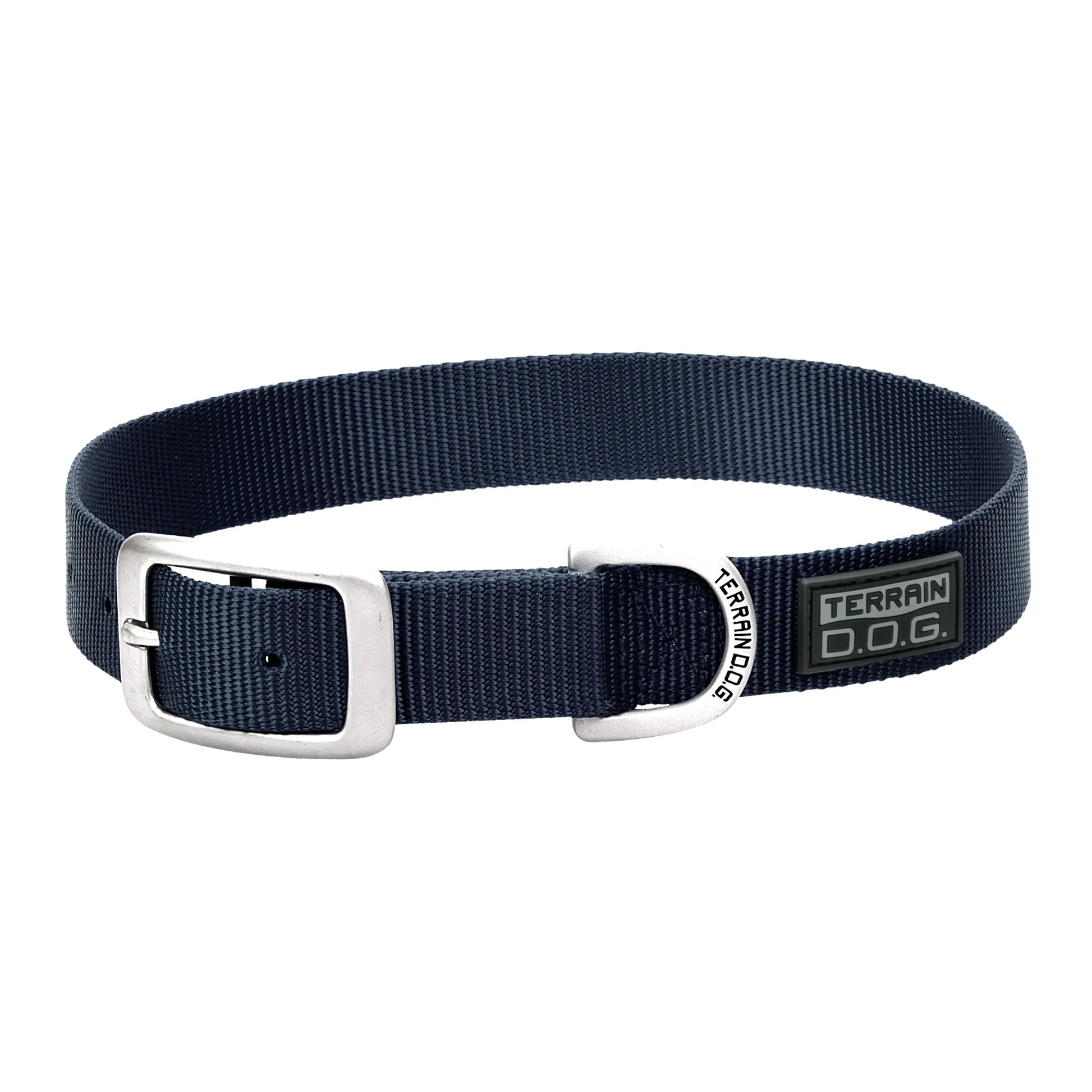 Navy blue Weaver Leather Terrain D.O.G. nylon dog collar featuring a heavy-duty matte silver buckle and engraved D-ring. This durable, adjustable collar is crafted from high-quality webbing for active pups. Perfect for daily walks and outdoor adventures, it combines rugged strength with a stylish, classic design. Essential gear for pet owners seeking reliability and comfort for their dogs.