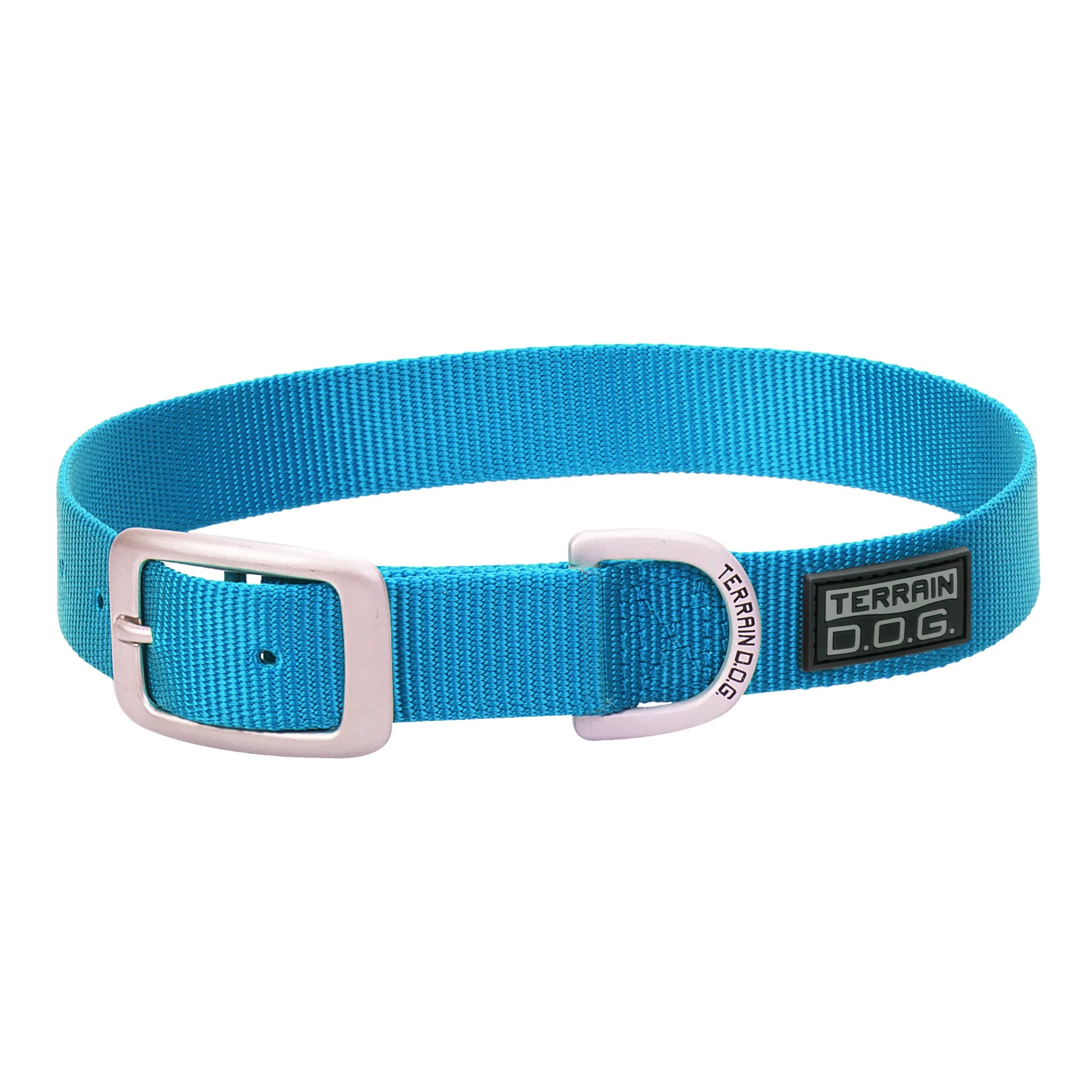 Vibrant blue Weaver Leather Terrain D.O.G. nylon dog collar featuring heavy-duty webbing, a durable silver metal buckle, and a matching D-ring engraved with the brand logo. This stylish, adjustable pet accessory includes a black rubberized Terrain D.O.G. patch, making it the perfect outdoor gear for active dogs. High-quality construction ensures comfort and security for your pup's daily walks and adventures.