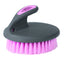 Weaver Leather Palm Brush (SOFT) featuring an ergonomic charcoal grey handle with a pink logo inlay and vibrant soft pink synthetic bristles. This round grooming brush provides a comfortable, secure grip for bathing and grooming horses or pets. A stylish and durable essential for any equestrian grooming kit or pet care routine.